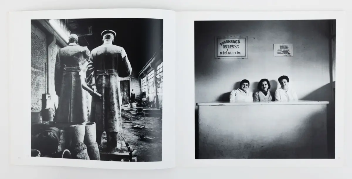 Open book spread with two black-and-white photos: left shows two figures in long coats from behind in a ruined factory; right shows three people in white coats behind a counter.