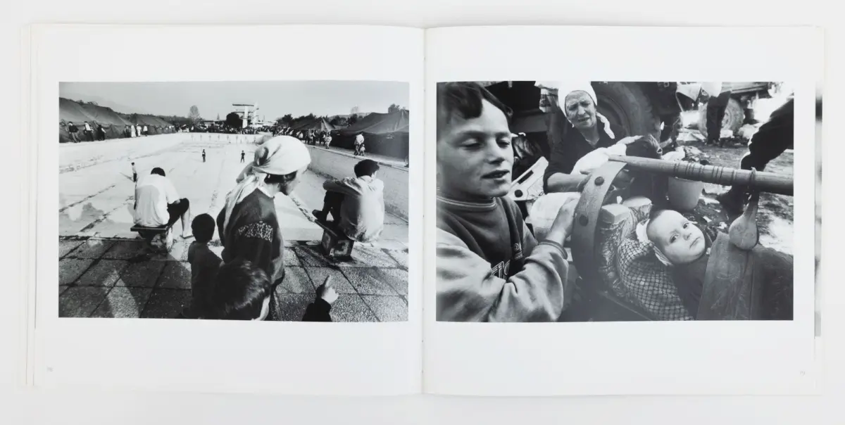 Two-page black-and-white photograph: left shows refugees along a long pool with tents; right shows people beside a large artillery gun, a baby nearby.