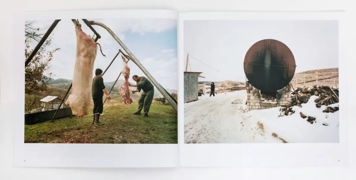 Left: two workers hang a large animal carcass from a metal frame in a hillside yard. Right: rusted circular tank on concrete supports amid snow.