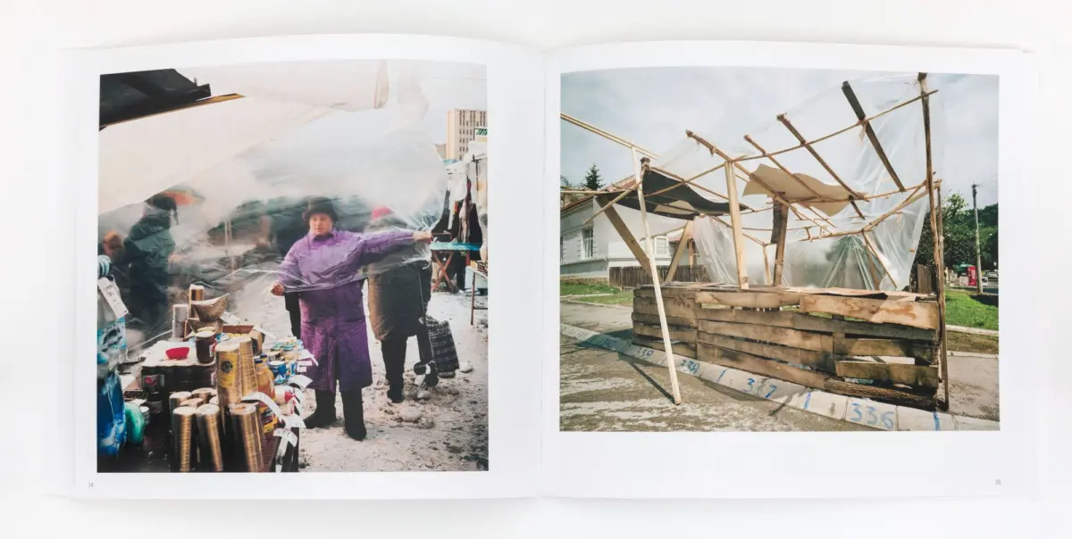Two-page spread: left market stall with a person in a purple coat under clear plastic; right a makeshift wooden-framed shelter covered in plastic.