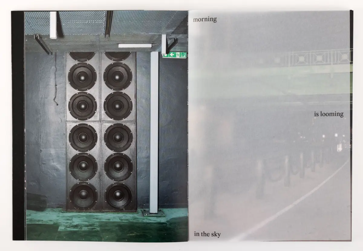 Open book spread; left shows a vertical stack of large woofers, right a gray panel with the words morning and is looming.