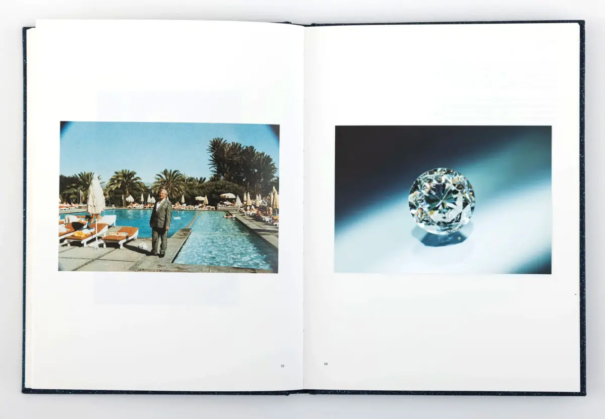 Open book showing left photo: person in a suit standing by a resort pool with palm trees; right photo of a large diamond.