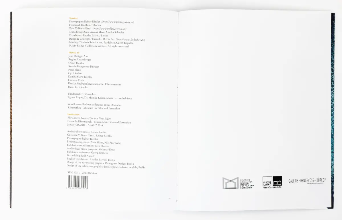 Open book spread with left page text, right page mostly blank, barcode bottom left, and logos bottom right