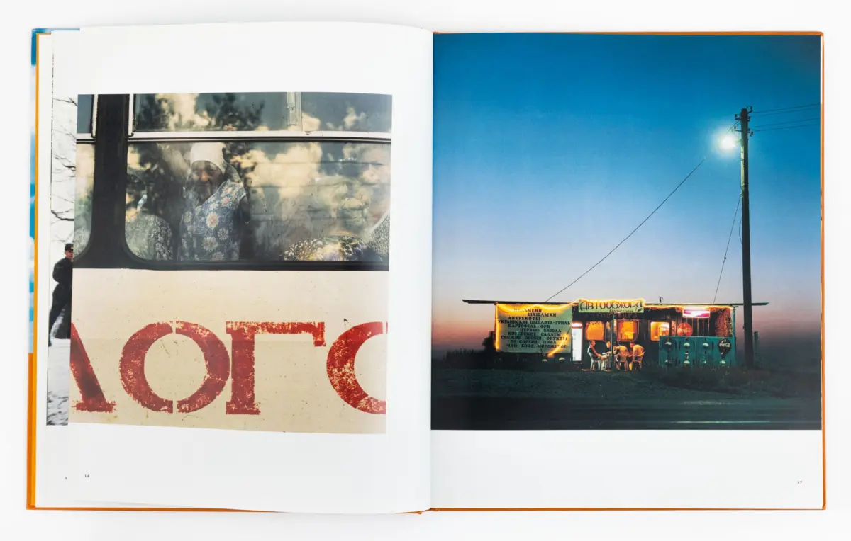 Two-page spread: left shows an elderly person behind a bus window in floral clothing; right shows a dusk street food stall with seated customers.
