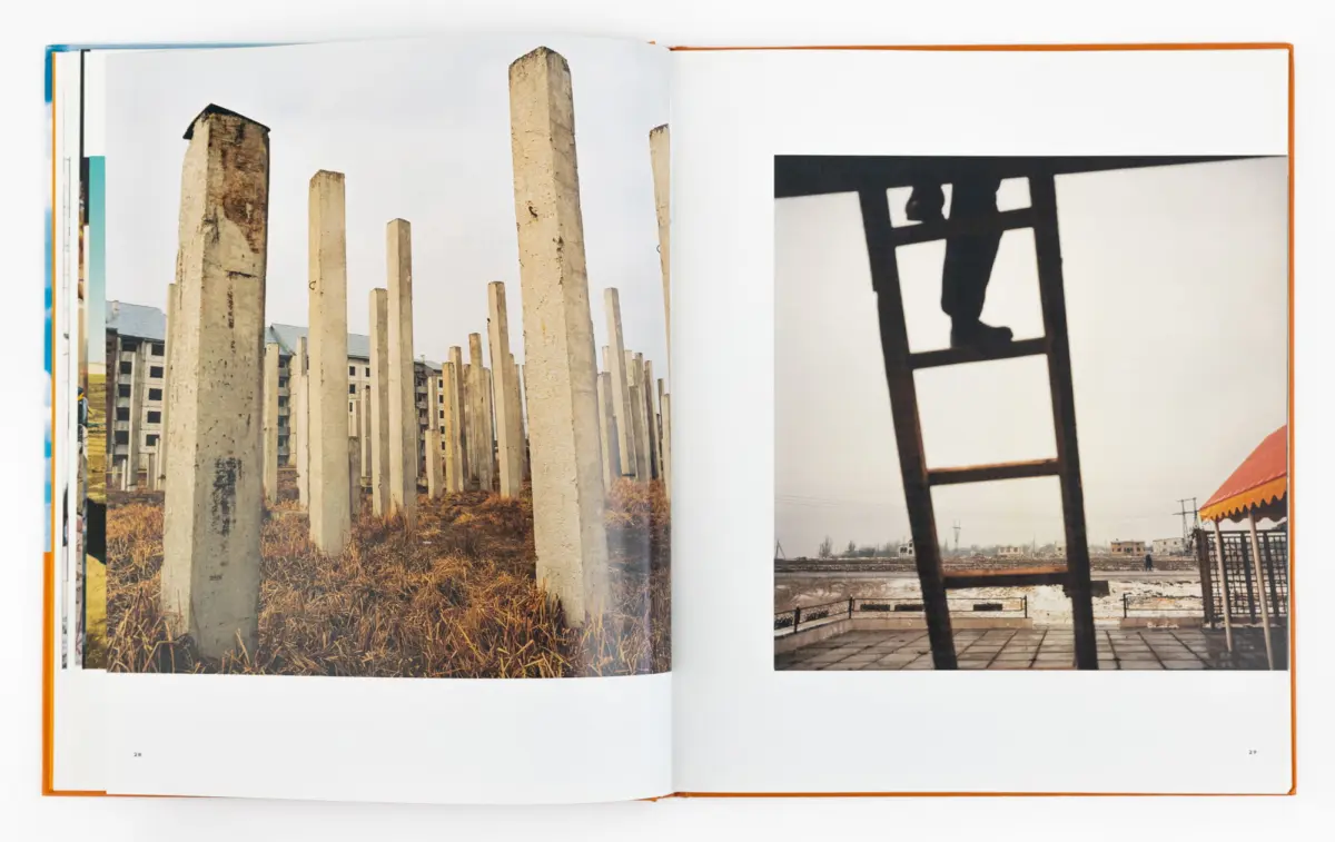 Two-page photo spread: left shows rows of vertical concrete pillars at a construction site; right shows a black metal frame silhouette.