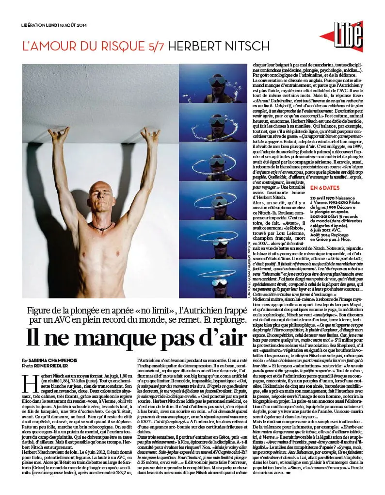 Shirtless Austrian free diver Herbert Nitsch raises arms in front of a white wall, next to a vertical strip of underwater mask-wearing images.