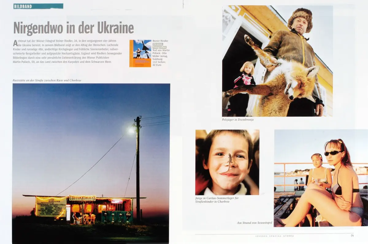 Magazine spread with German headline Nirgendwo in der Ukraine; man in fur hat holding a fox near a yellow building; other photos of people.