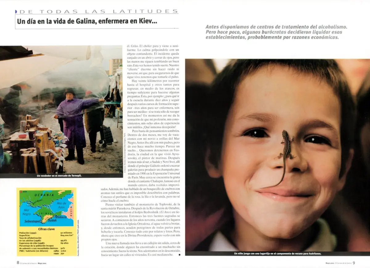 Close-up of a smiling child with butterfly face paint on the cheek, on a two-page magazine spread showing a market vendor on the left.