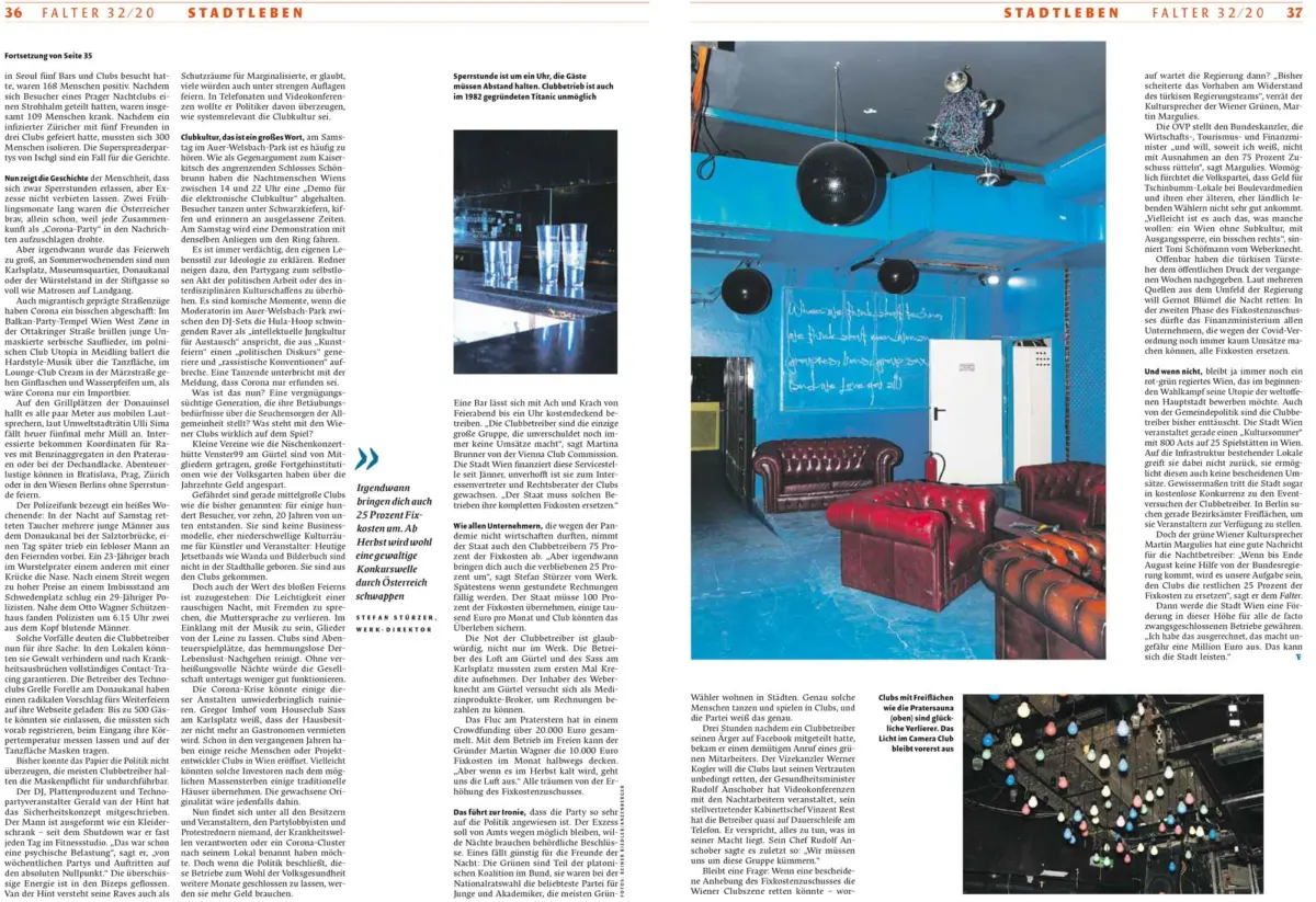 Blue nightclub interior with hanging disco balls, blue walls, and red leather couches.