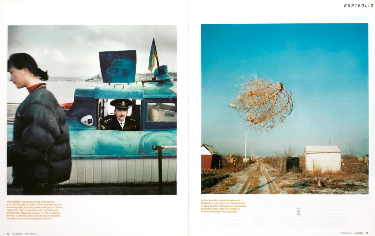 Left: woman in a black puffer jacket beside a turquoise boat with a police officer. Right: uprooted tree tangled around a pole over a rural road.