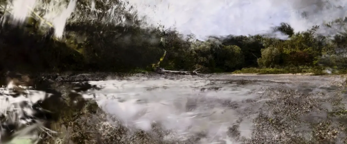 River flowing through a dense forest along a pebbled riverbank with fallen logs.