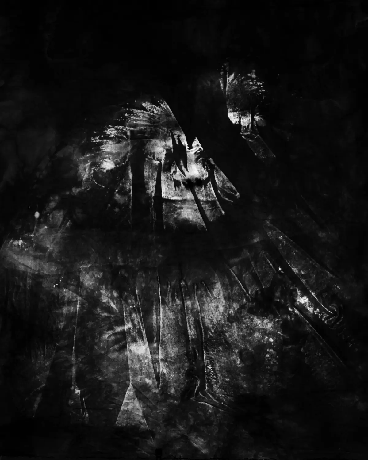 Abstract black-and-white composition with jagged overlapping shapes and smoky textures; no identifiable subject.