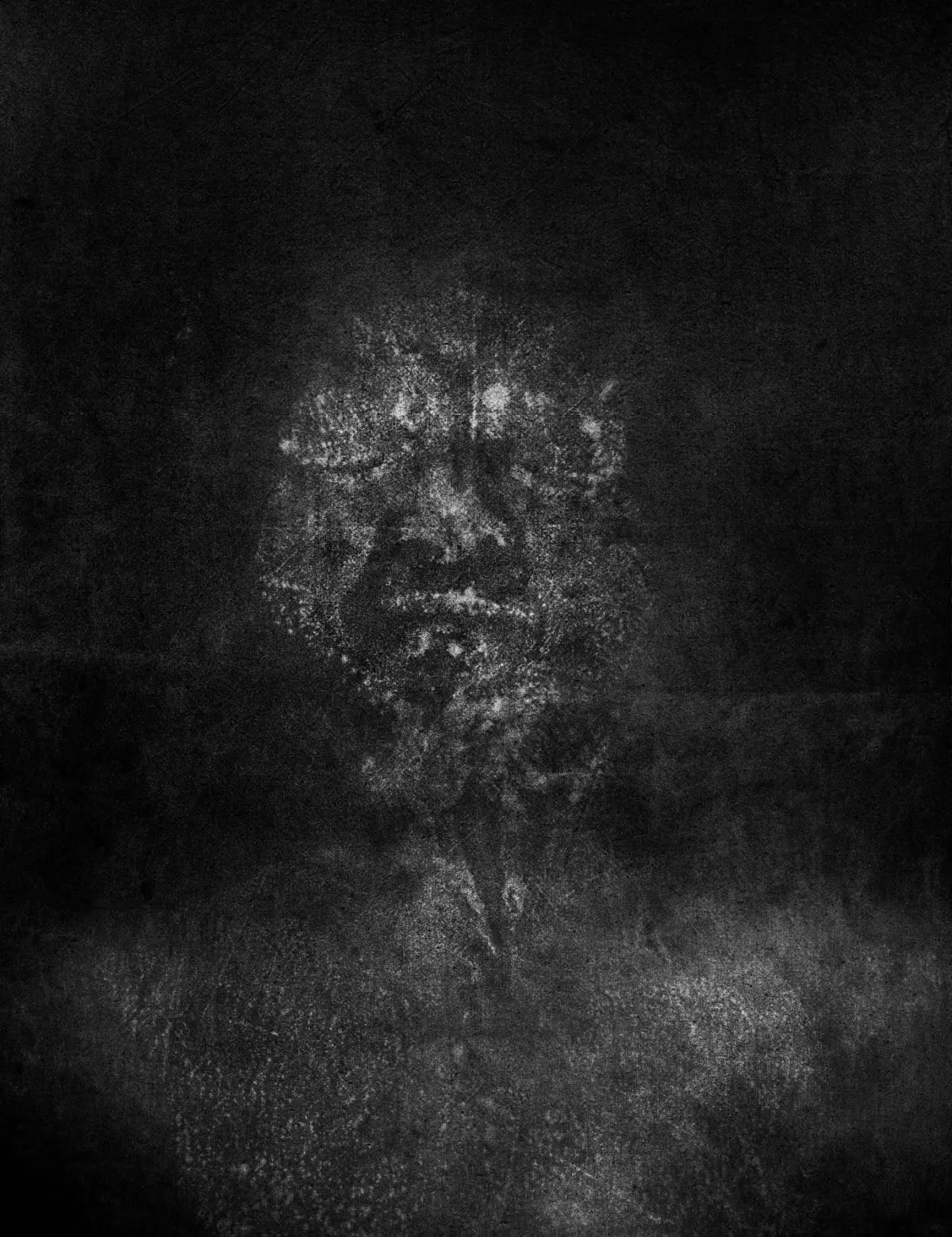 Chalk sketch of a skull on a dark textured wall.