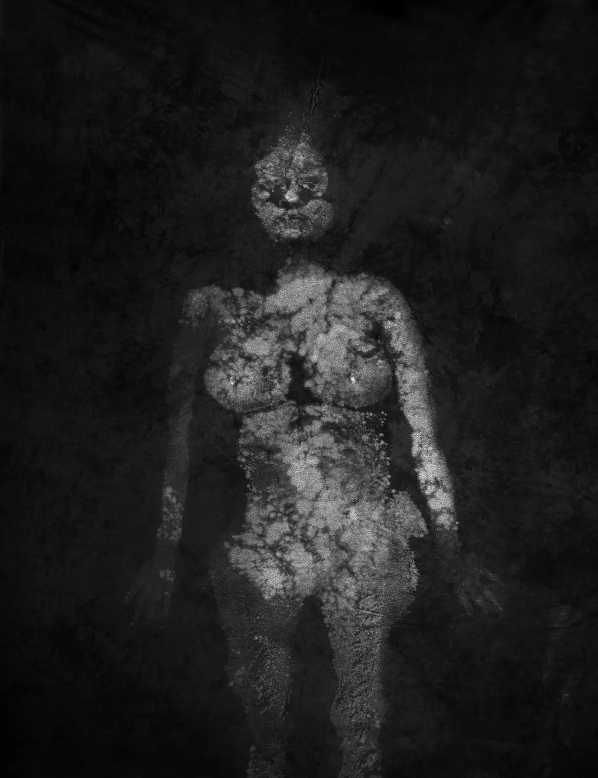 Silhouetted figure formed by clusters of particles stands against a dark, textured background.