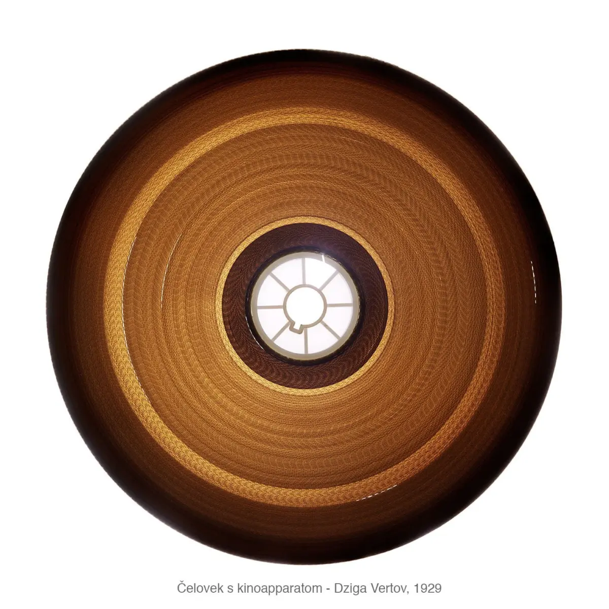 Circular wooden ceiling lamp with concentric rings and central hub