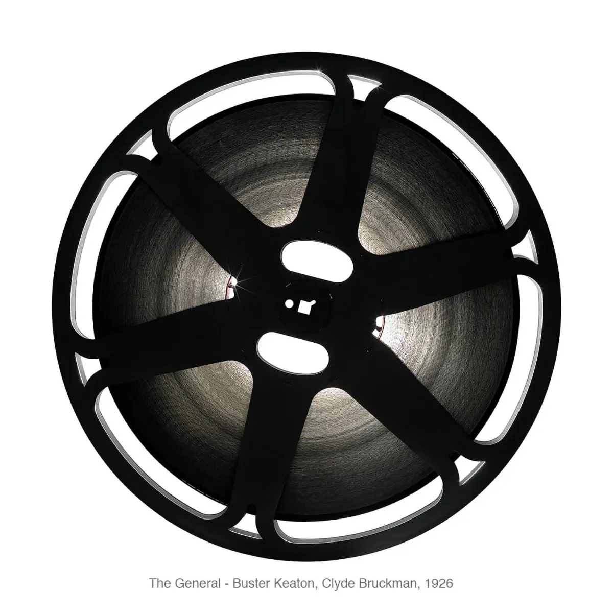 Front-facing black film reel with coiled film, backlit against a white background.