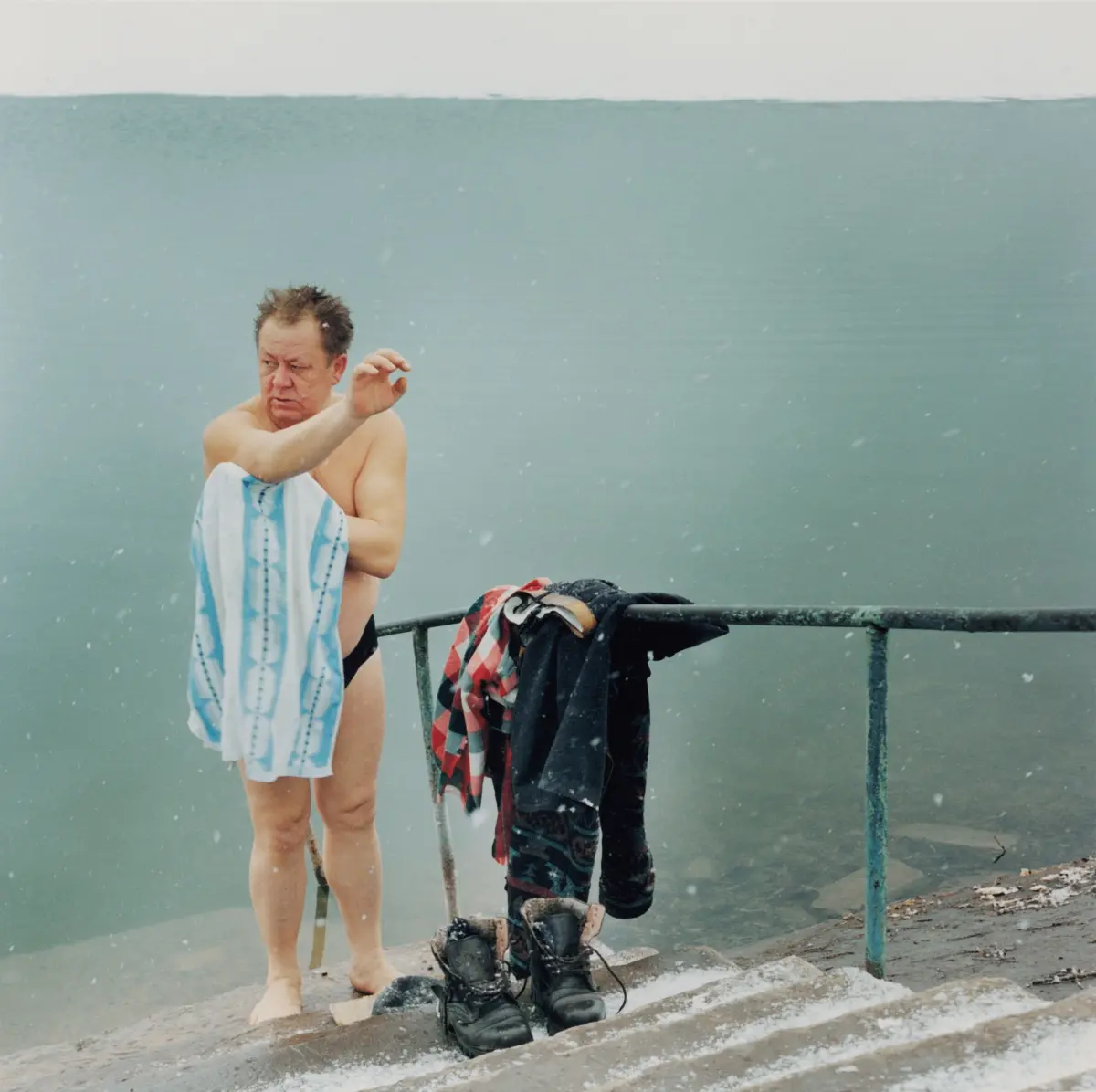 Winter bathing in the city pond of Ivano - Frankivsk.