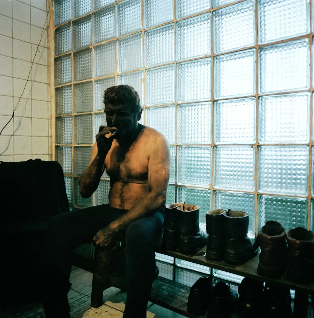 Miner at the Ukraina mine in Pereval's'k changing clothes at the end of his shift.