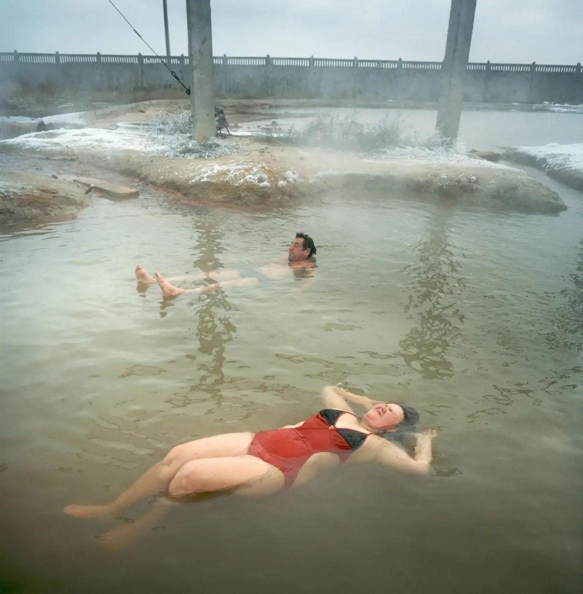 Bathing in winter in a disused thermal bath/ Crimea