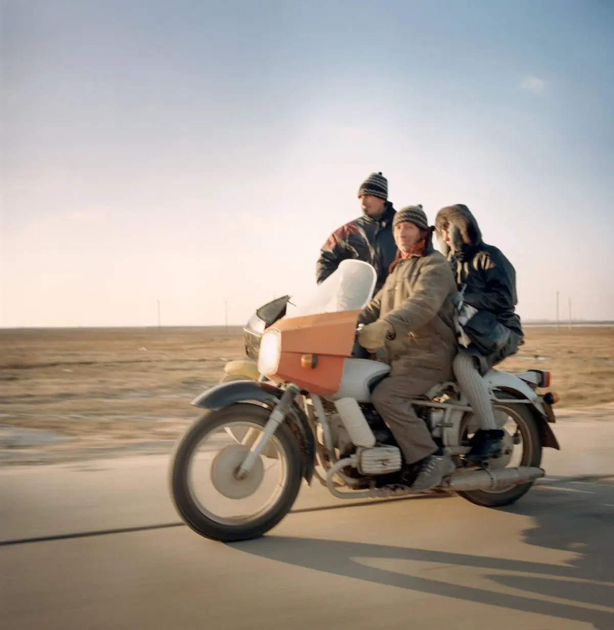 Motorcyclists on a country road in the Crimea