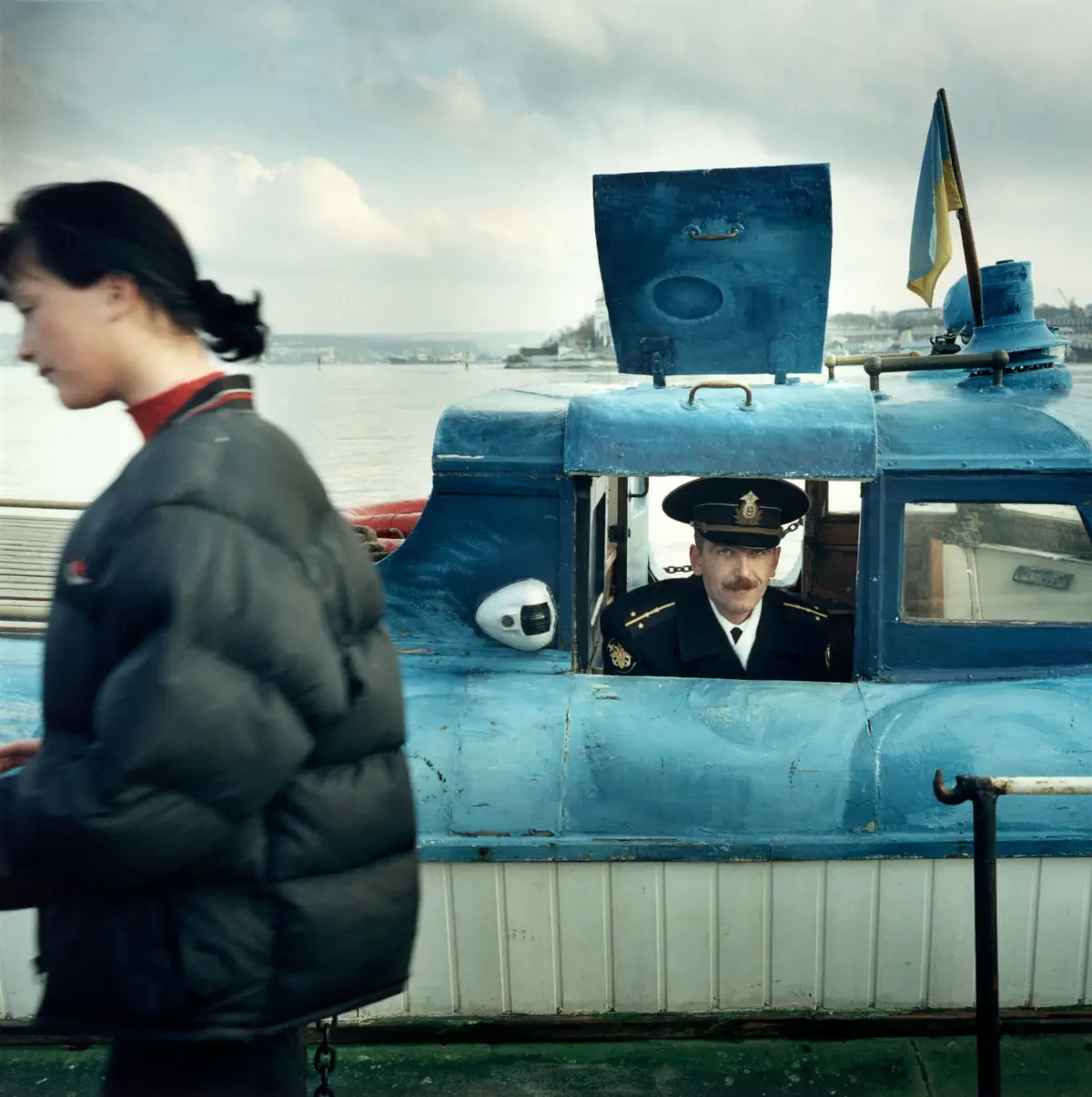 Captain of a small excursion boat in the harbour of Sevastopol/ Crimea
