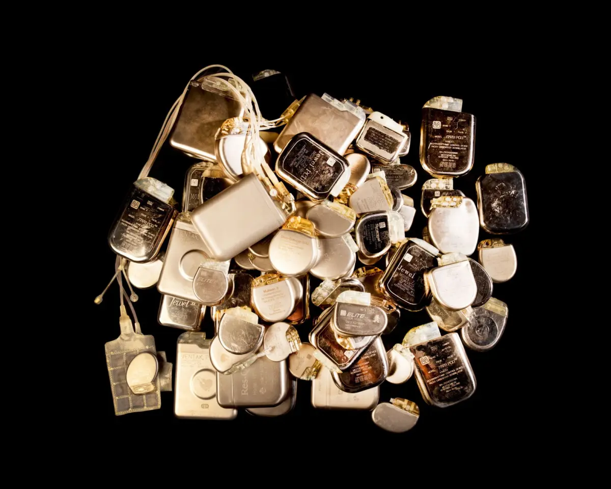 A pile of explanted pacemakers from various companies from 1960. Pacemakers stimulate the heart with electrical impulses to improve rhythm and intensity of the beats. Center for Medical Physics and Biomedical Engineering, Medical University of Vienna and General Hospital Vienna, Austria.