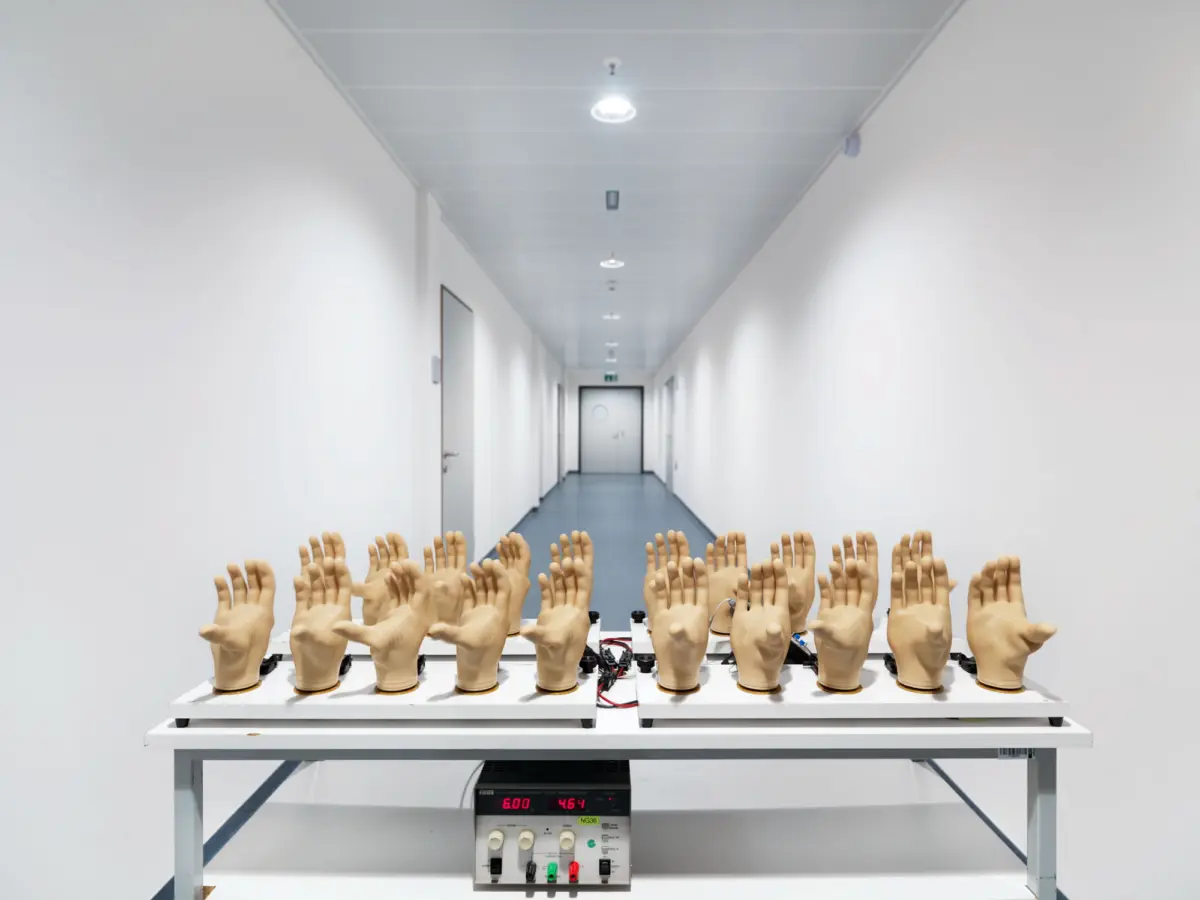 Myoelectric controlled hand prostheses on a test station. Each prosthesis is being opened and closed 1000 times before delivery. Otto Bock Healthcare Products GmbH, Vienna, Austria.
