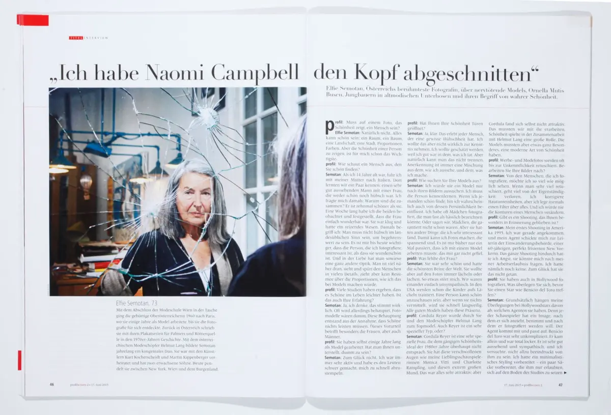Older woman with gray hair behind cracked glass on a German magazine spread.
